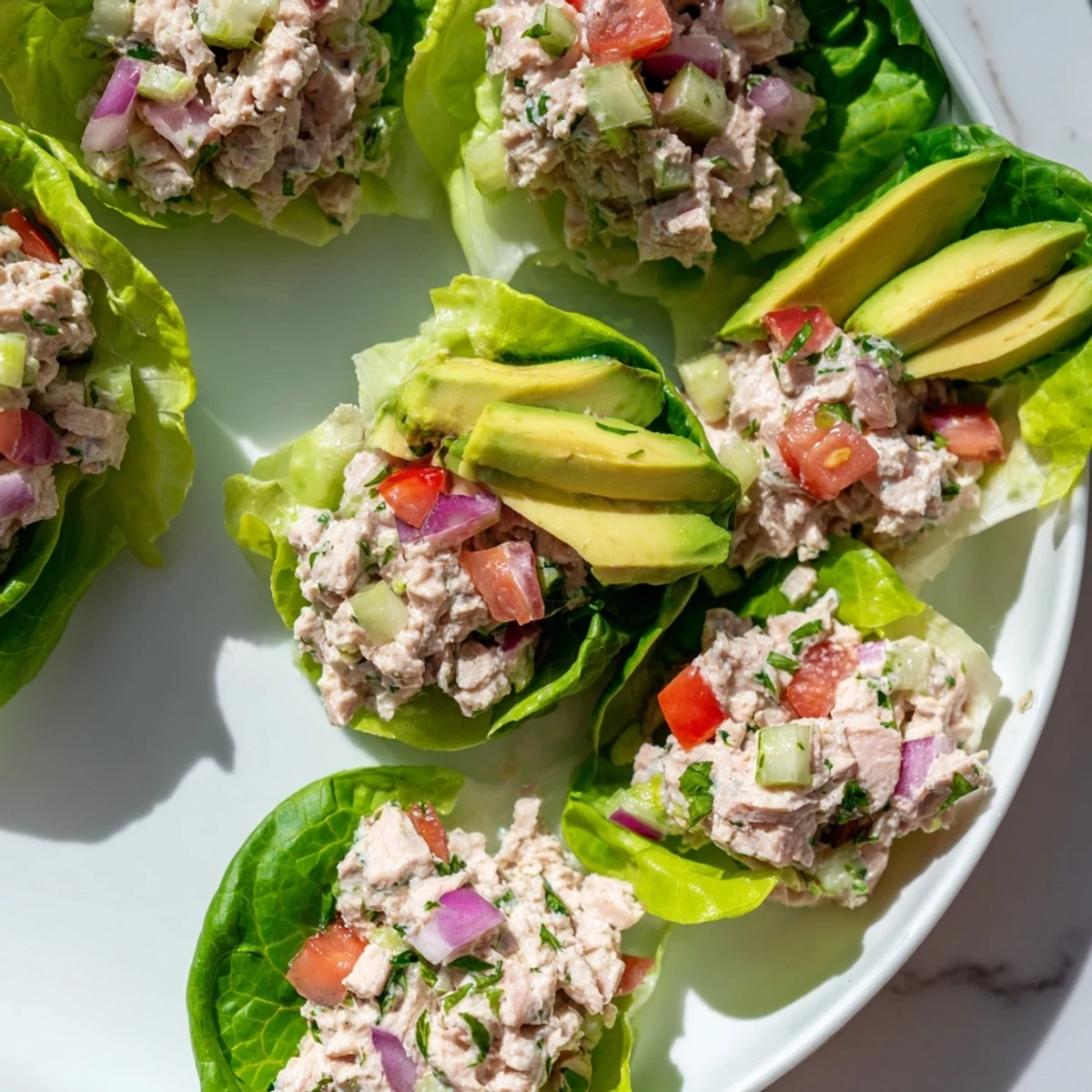 Fresh, vibrant Tuna Salad Lettuce Wraps offer a light lunch, packed with creamy tuna and crisp lettuce.