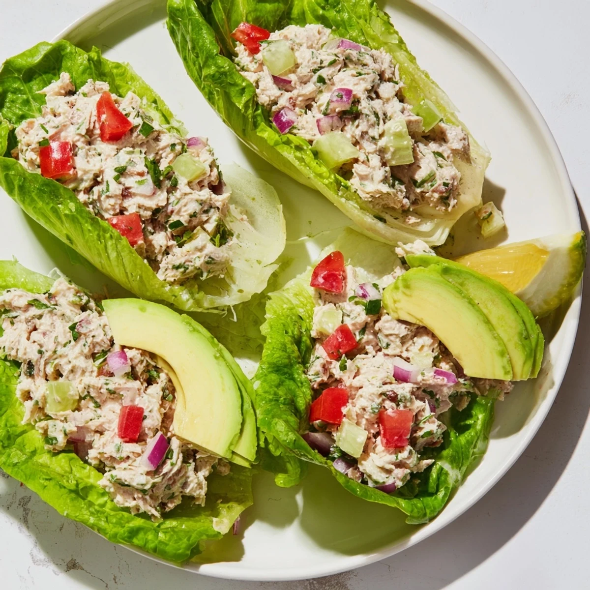 A close-up of delicious Tuna Salad Lettuce Wraps with avocado, ready to be enjoyed as a low-carb meal.