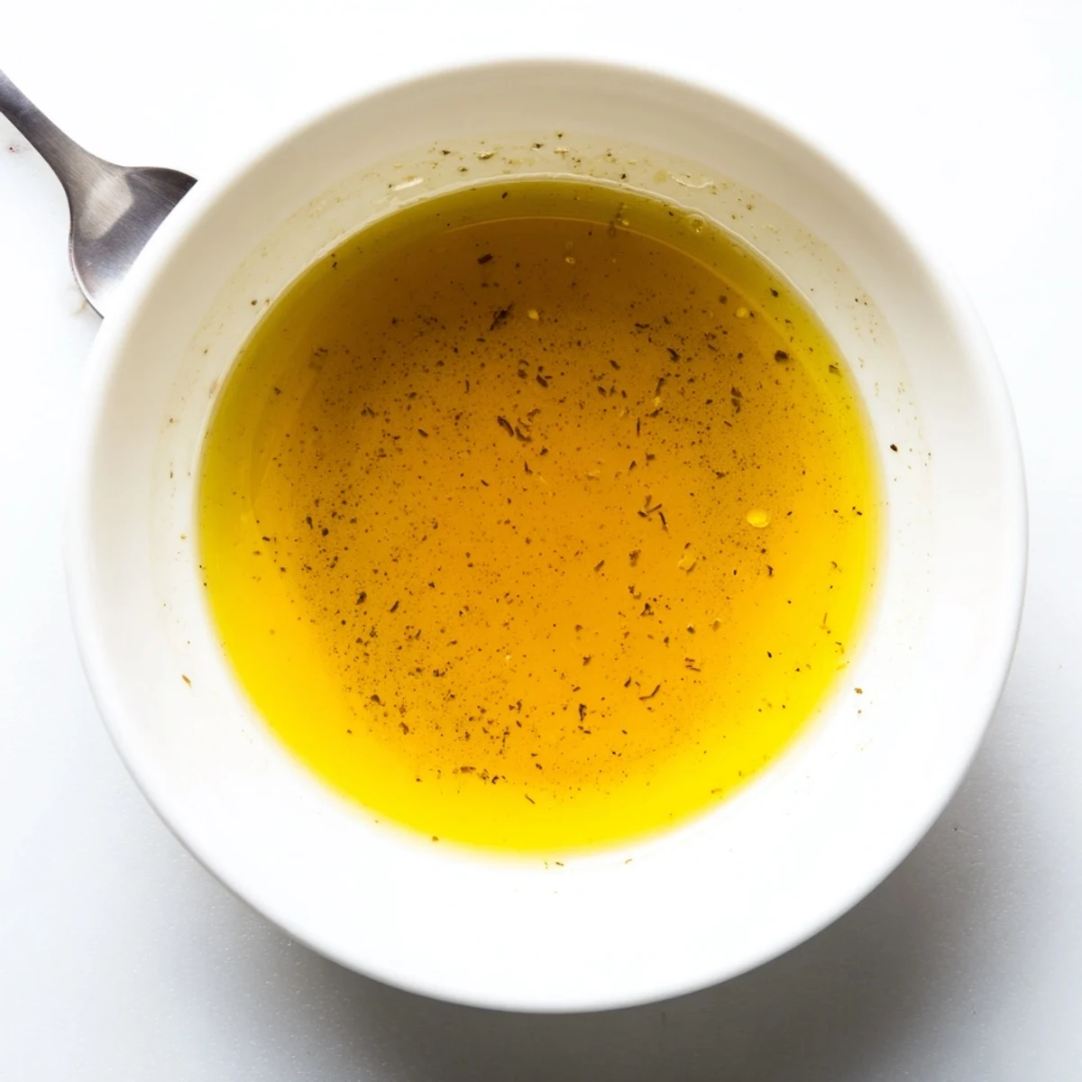 Creamy Simple Honey Vinaigrette Salad Dressing gets a beautiful swirl, perfect for drizzling on greens.