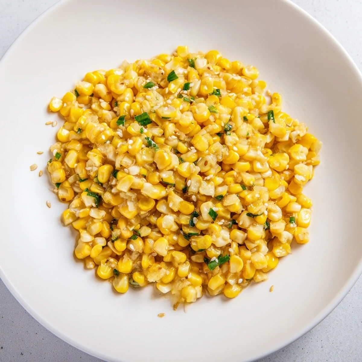 Golden Japanese Butter Corn kernels glistens, a flavorful side dish with garlic and butter.