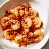 Vibrant image of easy Korean Garlic Butter Shrimp, sizzling in a skillet ready for a delicious meal.
