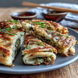 Flaky, savory Asian street food-inspired Spring Onion Pancakes for snacking.