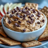 Scoop this no-bake Fiber-Packed Chickpea Cookie Dough Dip with crunchy pretzels.