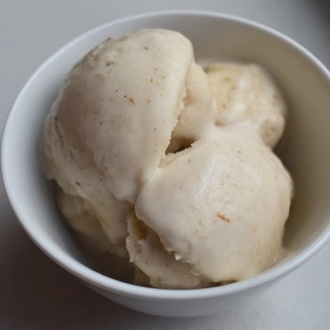 Creamy 2-Ingredient Banana Ice Cream freshly blended, a healthy frozen dessert served in a bowl.