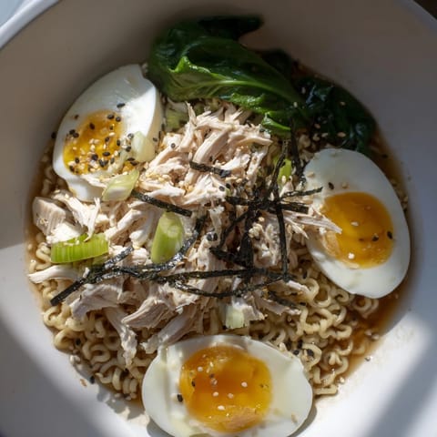 Creamy Chicken Ramen dish with Kewpie mayo, served hot in a bowl, perfect comfort food.