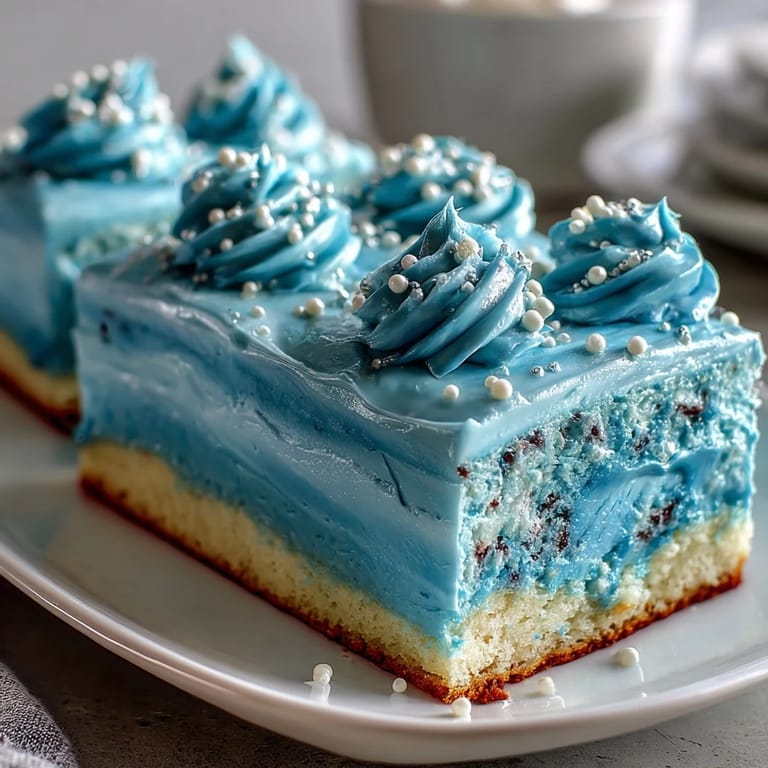 Vibrant Pisces Cake Sheet Cake featuring moist vanilla layers, swirling blue buttercream waves, and delicate white chocolate zodiac symbol.