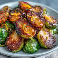1. Irresistible orange maple glazed Brussels sprouts roasted until golden and caramelized, finished with a glossy, citrusy-sweet glaze.  