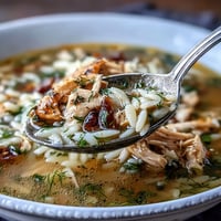 Bright Greek Lemon Chicken Soup with tender chicken and fluffy orzo.