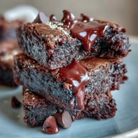 Fudgy tahini chocolate brownies with gorgeous chocolate swirls, perfect for dessert.